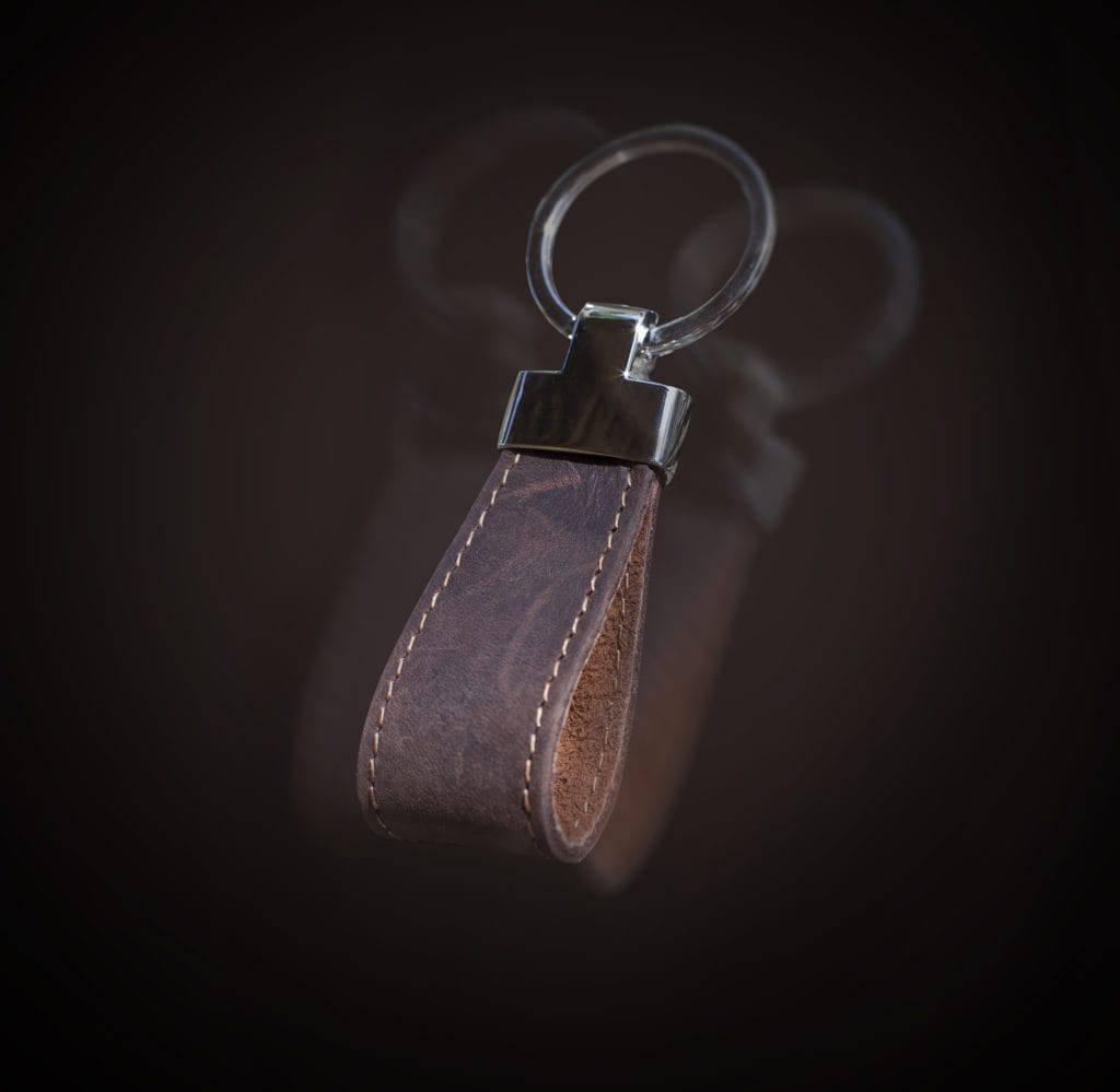 PORTACHIAVI IN CUOIO CON TESTINA IN METALLO - Record Moda